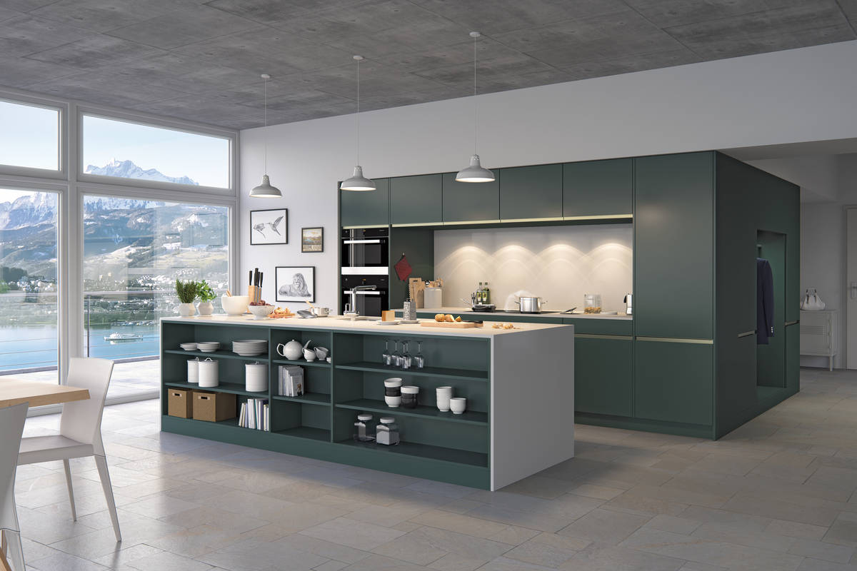 Damit die Traumküche auch zum Wohnraum passt, lassen sich die Fronten in Holz- oder Steinoptik mit Unidekoren kombinieren. Veriset.