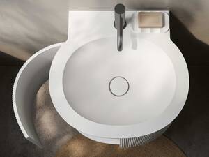 «Flow» zieht die Inspiration aus der Kraft und dem Fluss des Wassers. Dank dem Mineralwerkstoff «Solid Surface» begeistert die Linie mit einer angenehmen Haptik. Talsee AG.