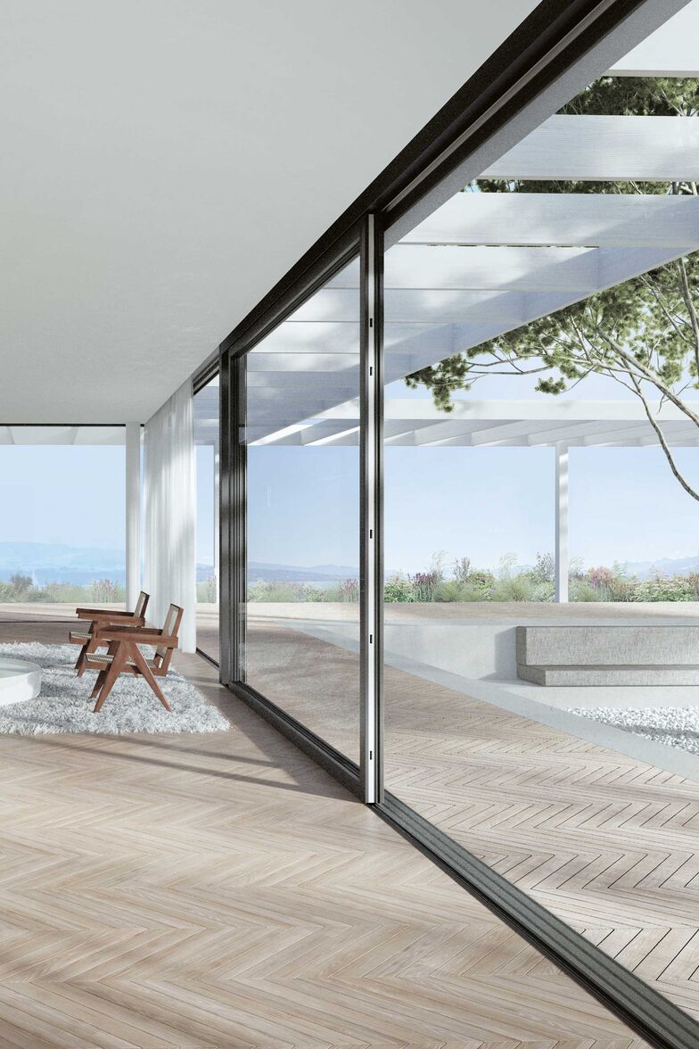 Viel Ausblick, wenig Rahmen: Die schlankste Holz-Metall-Schiebetür der Schweiz ist leichtgängig und einfach zu bedienen. Sonderausführungen in Aubergine, Schwarz und Eiche Gold. «ST2», 4B AG, www.4-b.ch