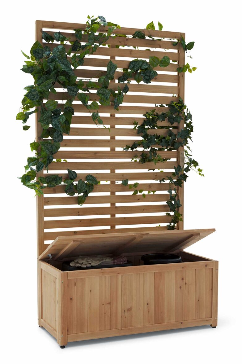 Sichtschutz und Stauraum in einem: Das 180 Zentimeter hohe Zwei-in-eins-Modul ist aus FSC-zertifiziertem Massivholz und UV- und witterungsbeständig. www.tchibo.ch