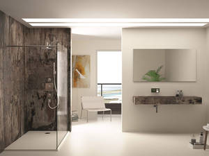 Ultrakompakt für Wand und Boden: Aus dem innovativen Werkstoff Dekton können bis zu drei Meter lange Waschtische konstruiert werden, Das Material eignet sich auch für besonders hygienische, robuste fugenlose Wände und Böden. Hier bringt der dezente Farbton «Zenith» die Waschbecken zur Geltung. Mit vielfältigen exklusiven Oberflächenfinishs kann Dekton industrielle Materialien, Zement, natürliches Holz oder Naturstein perfekt nachahmen und ist gleichzeitig unübertroffen pflegeleicht. Cosentino Swiss AG.