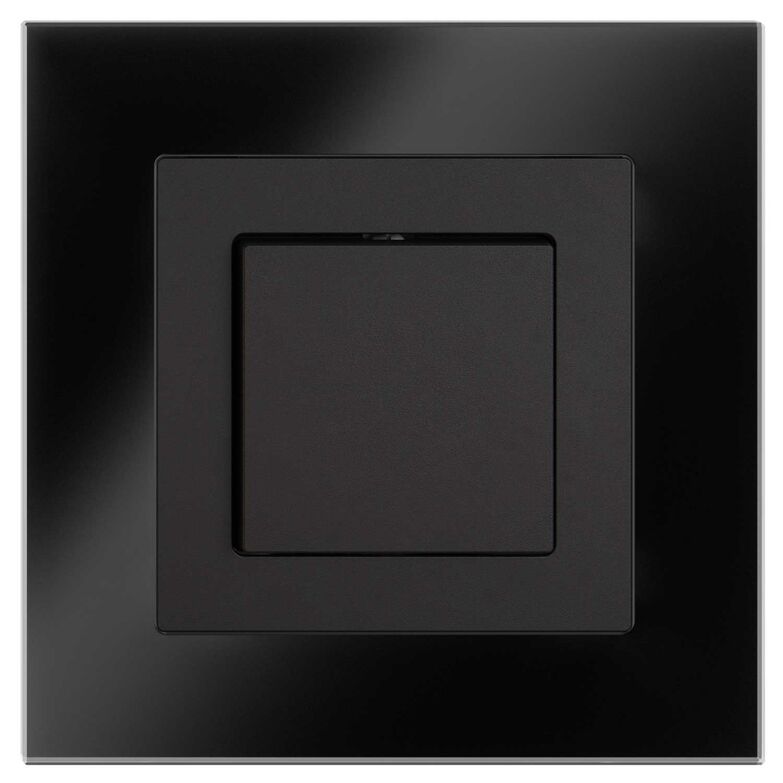 Der tiefschwarze Glasrahmen des «Edizio.liv.Prestige» bringt einen luxuriösen Touch an die Wand und unterstreicht die quadratische Form. www.feller.ch