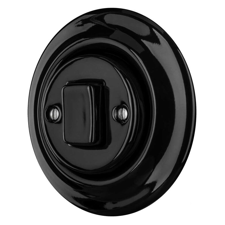 Die formschönen Schalter «Roo Nigra» werden in der Tschechoslowakei von Hand aus Porzellan gefertigt. Der Rahmen und die Wippe sind hier in Schwarz ausgeführt. www.katypaty.ch