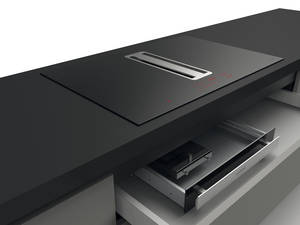 «Flow-In Pro» besteht aus einer kompakten Einheit mit Induktionskochfeld und Abdeckplatte, EBM-Papst-Motor unter dem Kochfeld, Schublade für Kondenswasser und einem Umluftfilter-Element. Silverline.